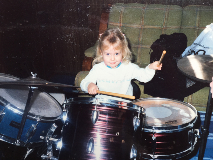 Little Margo playing drums