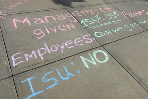 Local 3236 chalked up campus with their message