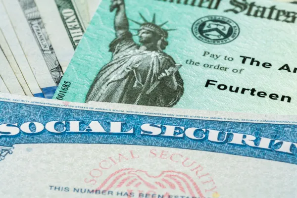 Stock photo of a Social Security card and check 