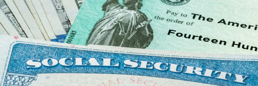 Stock photo of a Social Security card and check 