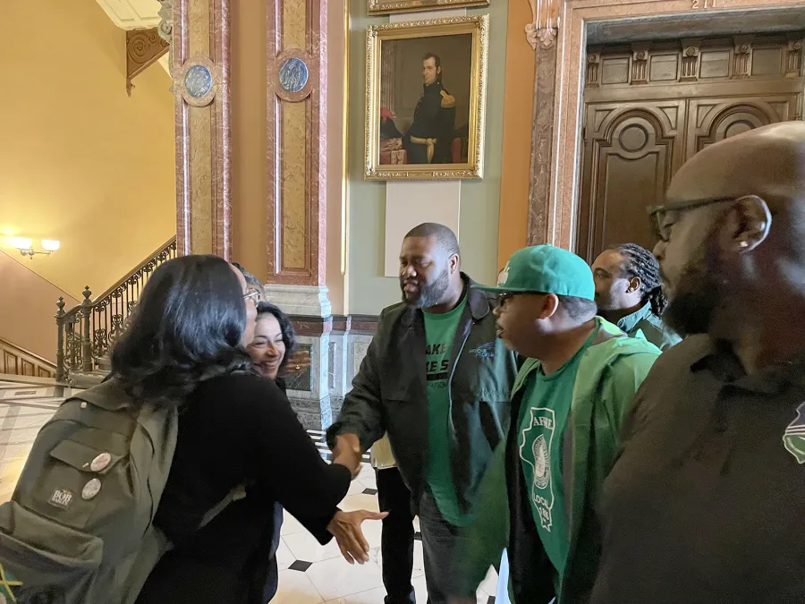 A photo of AFSCME members at the Springfield hearing.