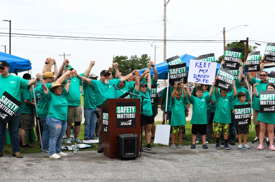 Menard Correctional Employees protest with signs saying "Our Safety Matters."