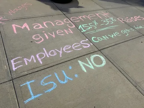 Local 3236 chalked up campus with their message