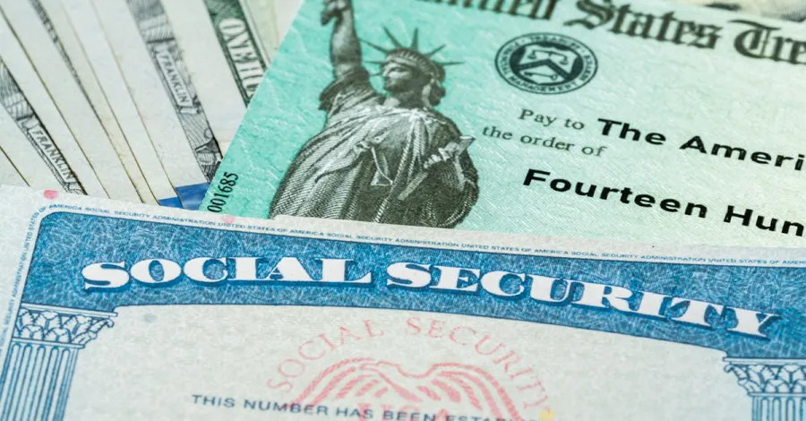 Stock photo of a Social Security card and check 