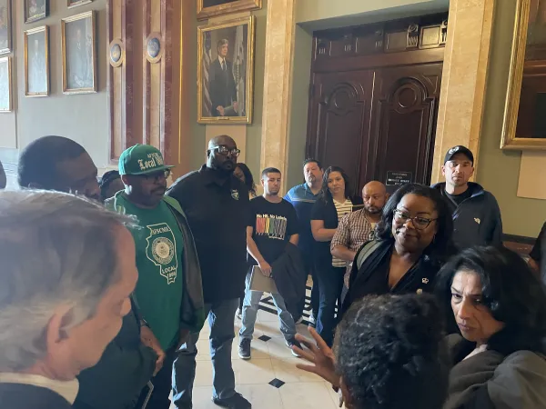 A photo of AFSCME members at the Springfield hearing.